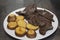 Anticuchos, Peruvian cuisine, grilled skewered beef heart meat with boiled potato and aji sauce chili