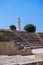 Antient greek amphitheater and lighthouse in Archeological park in Paphos
