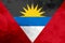 Antigua and Barbuda polygonal flag. Mosaic modern background. Geometric design