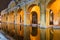 ANTIGUA, GUATEMALA - MARCH 26, 2016: Arches public laundry tank on Tanque la Union square in Antigua Guatemala town