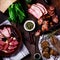 Antipasti and catering platter with different meat products.