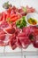 Antipasti Platter of Cured Meat, jamon, sausage, salame on whi