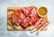 Antipasto background.The various meats