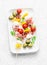 Antipasto skewers. Mediterranean appetizer to wine - prosciutto, bell peppers, cherry tomatoes, mozzarella cheese on skewers. Deli