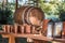 Antique Barrel, Brown Cups, Lamps and Copper Glasses on Wooden Table