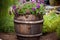 antique barrel repurposed as a flower planter