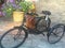 Antique bicycle with flower basket