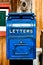 Antique Blue Letter Box on the Telegraph made of wood