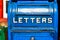 Antique Blue Letter Box on the Telegraph made of wood