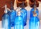 Antique blue soda syphon bottles on flea market