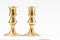 Antique brass candle stick on white background