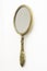 Antique brass hand-mirror