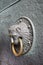 Antique brass lion door knocker