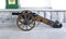 Antique bronze cannon on a wooden carriage