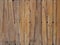 Antique brown teak wooden wall panel, vertical wood planks