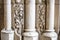 Antique building`s detail of white limestone pillars or columns