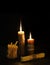 Antique candles in the darkness