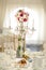 Antique candlestick with wedding bouquet.wedding candlestick with flower decoration before wedding ceremony.