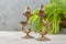 Antique candlesticks on concrete background