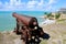 Antique cannon looking at sea