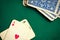 Antique cards on green casino table