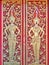 Antique carving golden Thai pattern or Lai Thai on red background.