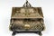 antique casket made of metal decorated with traditional applications