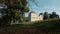 Antique castle with red roof, old gate, good weather