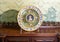 Antique ceramic plate in the Green Room of the Pena Palace with images of Queen Maria II and her son Pedro V.