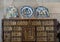 Antique ceramic plates atop the deskin the office of Queen Amelia in Pena Palace in Sintra, Portugal.