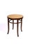 Antique chair without back on white background. Beech bentwood furniture with caned seat and backrest