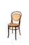 Antique chair on white background. Beech bentwood furniture with caned seat and backrest. Michael Thonet chair number 11 made of