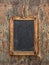 Antique chalkboard on wooden texture. Rustic background