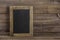 Antique chalkboard on wooden texture. Rustic background