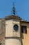 Antique clock tower and bells in the old European city