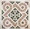 antique close up of pale and multi color geometrically intricate patterned marble mosaic tile floor background