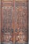 Antique close wood doors of the temple. Background of wooden tex