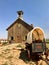 Antique covered wagon and settler church in watercolor