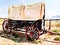 Antique covered wagon in watercolor