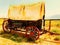 Antique covered wagon in watercolor