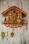 Antique cuckoo clock hanging on the wall