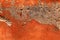 Antique damaged orange plaster texture