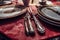 Antique dinner sett on table. Vintage Old Utensils: Forks, Plates, Spoons and Knifes