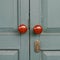 Antique Doors locked on green door.