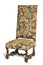 Antique early tapestry covered high backed chair on white backgr