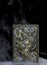 Antique embossed books with sculptured skull book ends with Smokey and spooky background Handmade with silicon resins and sand