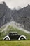 Antique european classic vehicle in Norway. Troll massif. Trollveggen