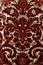 Antique fabric with dark wine color embroidery patterns