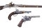 Antique flintlock rifle, percussion pistols and revolver. Evolution of Firearms.