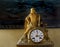 Antique French mantle clock with statuette of King